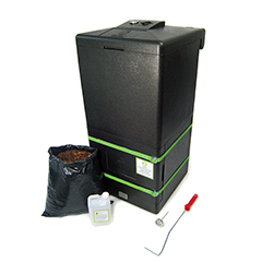 Black HOTBIN compost bin with black sack of compost and tools 