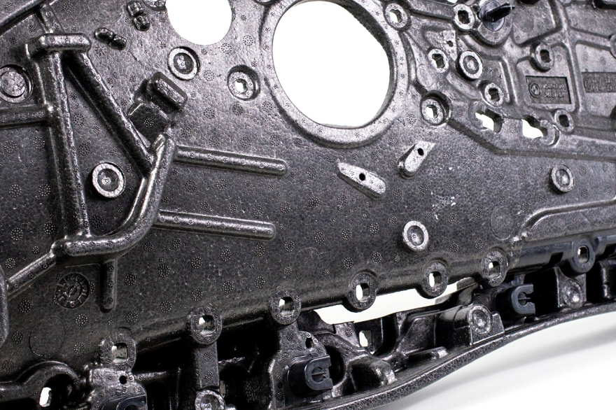 A black car trim panel made from ARPRO